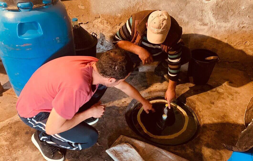 In spring, winemakers open their Kvevris, after the Georgian clay amphorae were closed during winter.