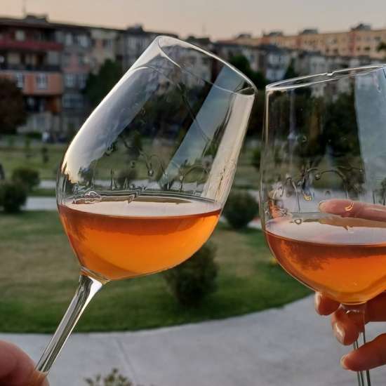 Two Glasses of Kisi Orange Wine