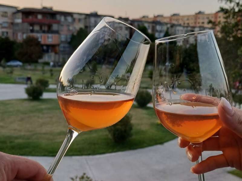Two Glasses of Kisi Orange Wine